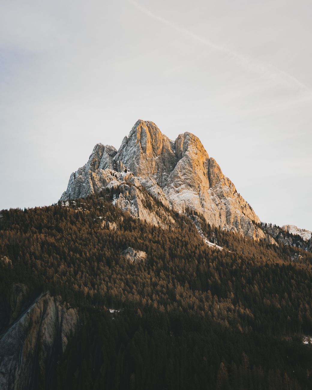 Limestone cliff faces in the Italian Alps at sunset